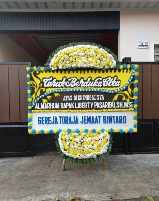 Papan Bunga Duka di Sirimau